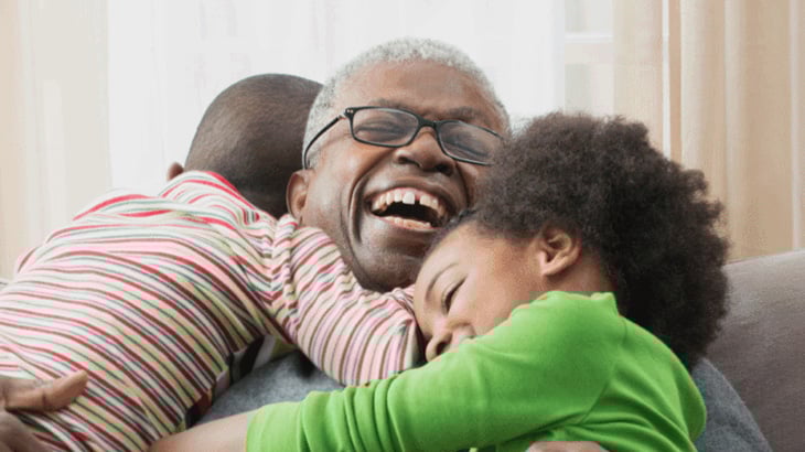 Man hugging children